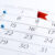 Many different pins on the calendar close-up. Important date. Place for text. Planning concept.